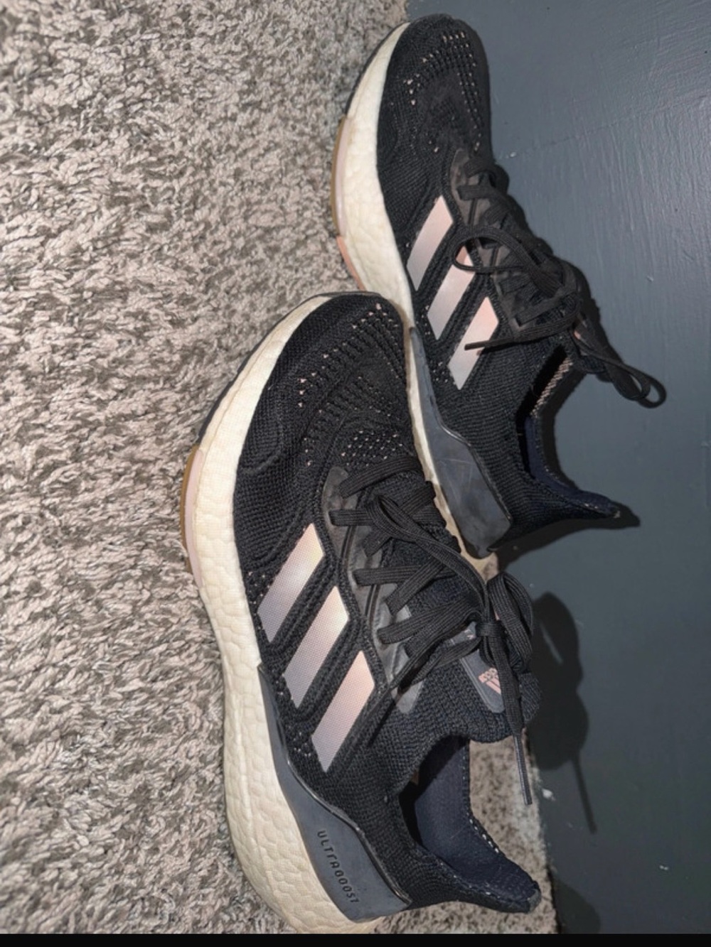 adidas women’s Black Sneakers with Pink Stripe Accents